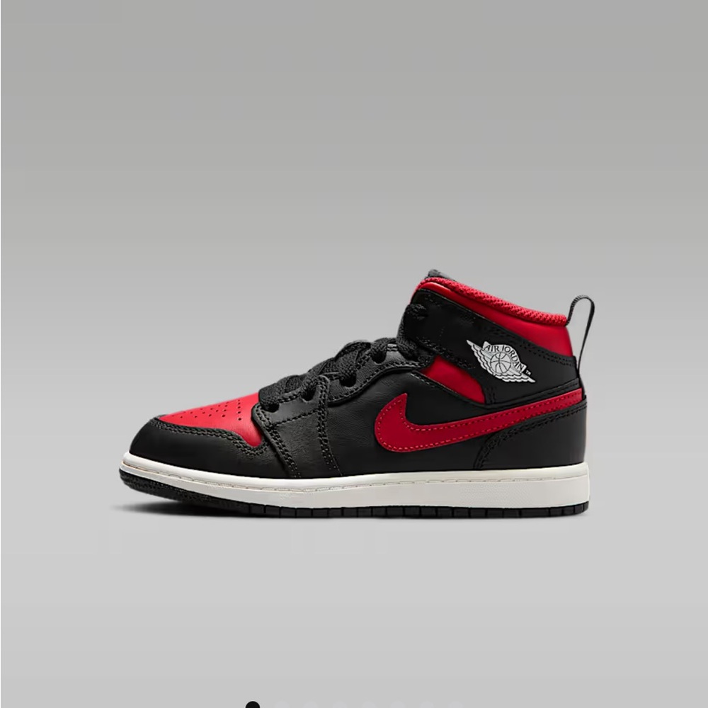 Jordan 1 Mid Nike Red, Black, and White sneakers